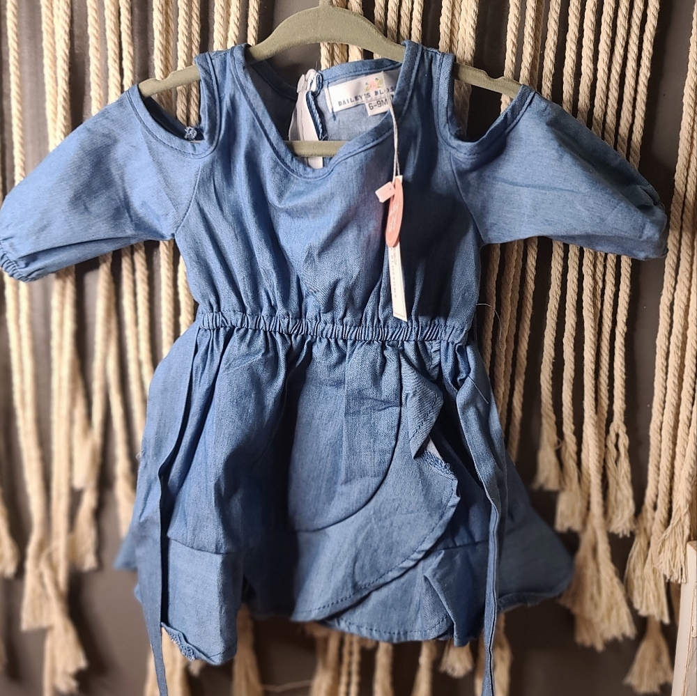 Beautiful cold shoulder denim dress by Baileys blossom in 6-9 months.